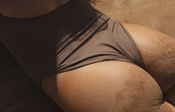 woman laying on stomach